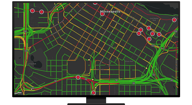 A graphic of a computer monitor displaying highways and route points in dark gray and green