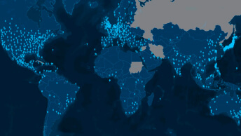 A world map in shades of dark blue scattered with clusters of glowing light blue map points