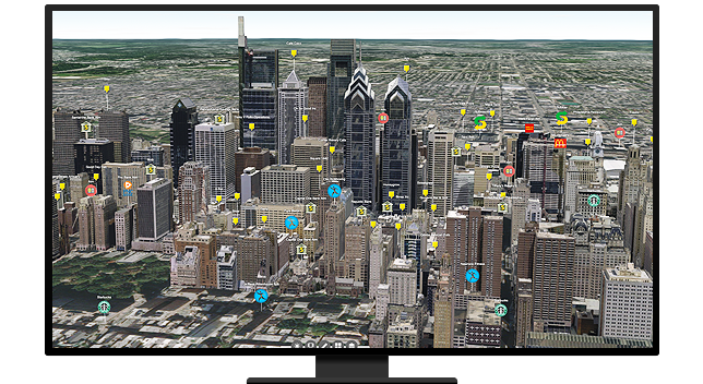 Graphic of a computer monitor displaying an aerial view of a city full of skyscrapers with distant suburbs in the background 