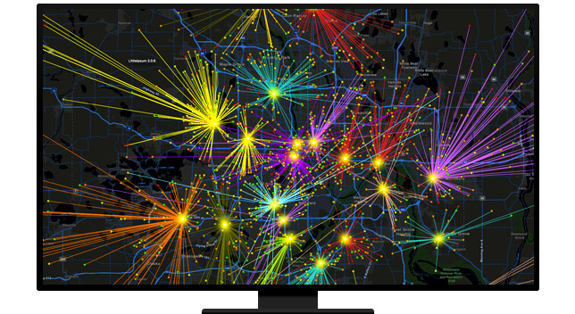 A graphic of a computer monitor displaying a map in vivid yellow, purple, red and blue on a black background