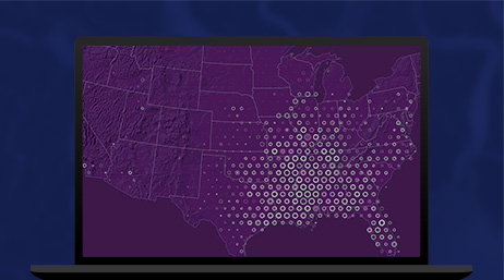 A purple map of the United States displayed on a laptop computer