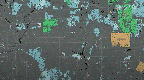 A screencap from the featured video showing a map with areas shaded in light blue, green, and orange on a gray background
