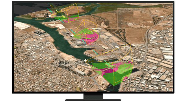 Écran d’ordinateur affichant une photo aérienne d’une ville dans le désert avec des segments ombrés en vert et en rose