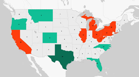 A map of the US in light gray with several states colored in aqua, green, and red