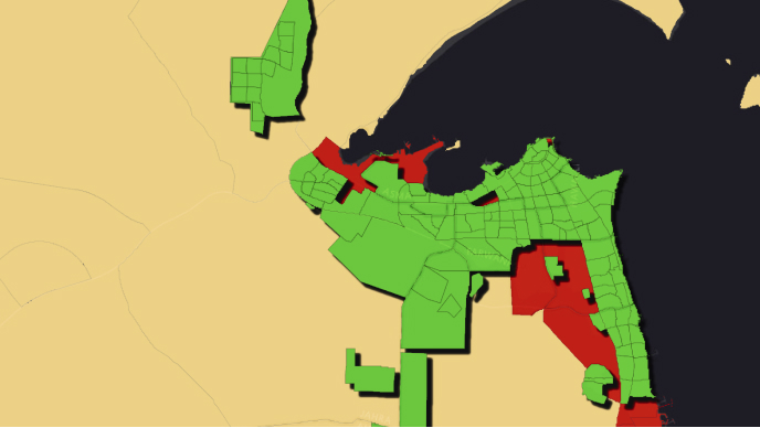 Map with areas shaded green, red, and black on a beige background 