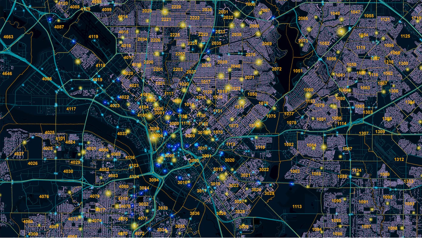 City map in blues and black with road systems in bright blue, scattered with glowing yellow concentration points
