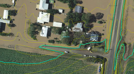 An aerial view of a Queensland farm with a green line illustrating the flooding routing