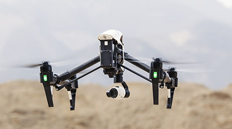 A drone scanning a mining site from the sky