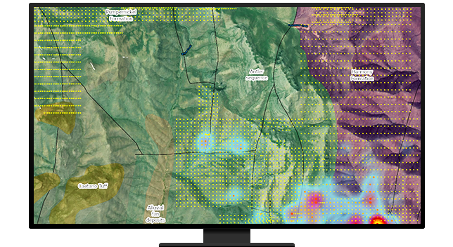 A desktop computer displaying mapping and analysis tools in ArcGIS software