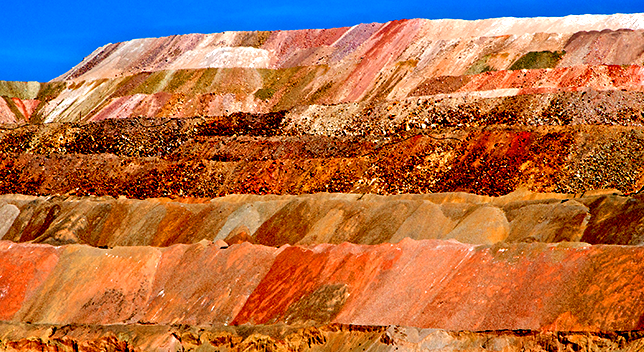 A red heap/leap stockpile at a quarry