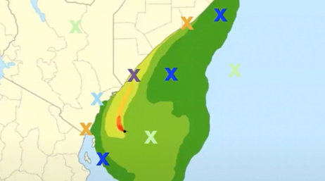 A coastline map in beige and green with a light blue ocean and scattered multicolored markers