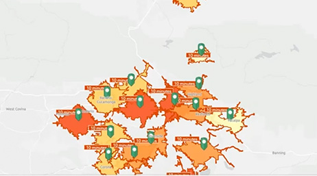 A screencap from the featured video that shows a country map with areas shaded in orange and yellow scattered with green map points