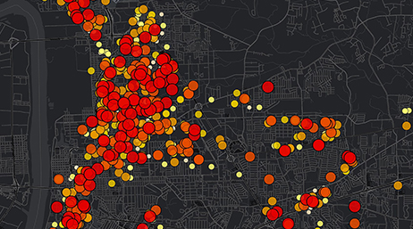 A dark mode map covered in many overlapping red, orange, and yellow dots