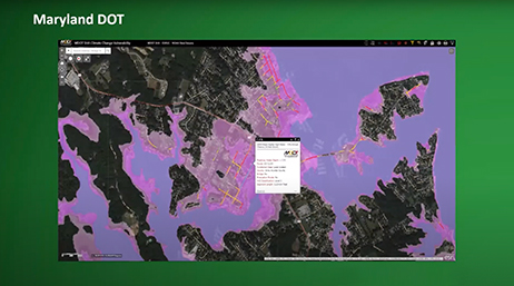 A presentation slide of the Maryland Department of Transportation’s SHA Climate Change Vulnerability dashboard that shows a dark map highlighted in shades of purple