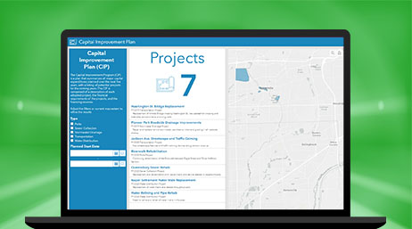 A laptop computer showing a Capital improvement plan web page open showing seven projects happening and a map of where they are located