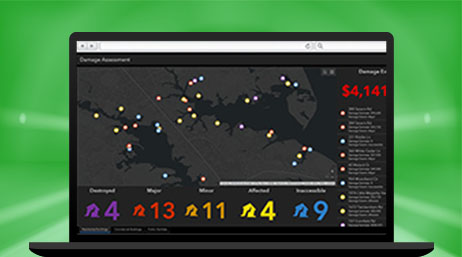 A laptop computer showing a dashboard with a map of colored dots indicated damaged locations, colored numbers below the map corresponding with locations, and total damage cost in the side bar