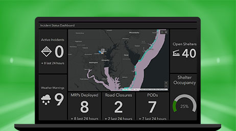 A desktop computer showing an incident status dashboard that shows the area affected in purple, the number of open shelters, weather warnings, active incidents, road closures, and more