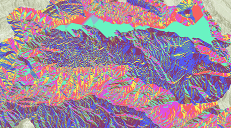 An infrared contour map in purple, pink, and aqua blue