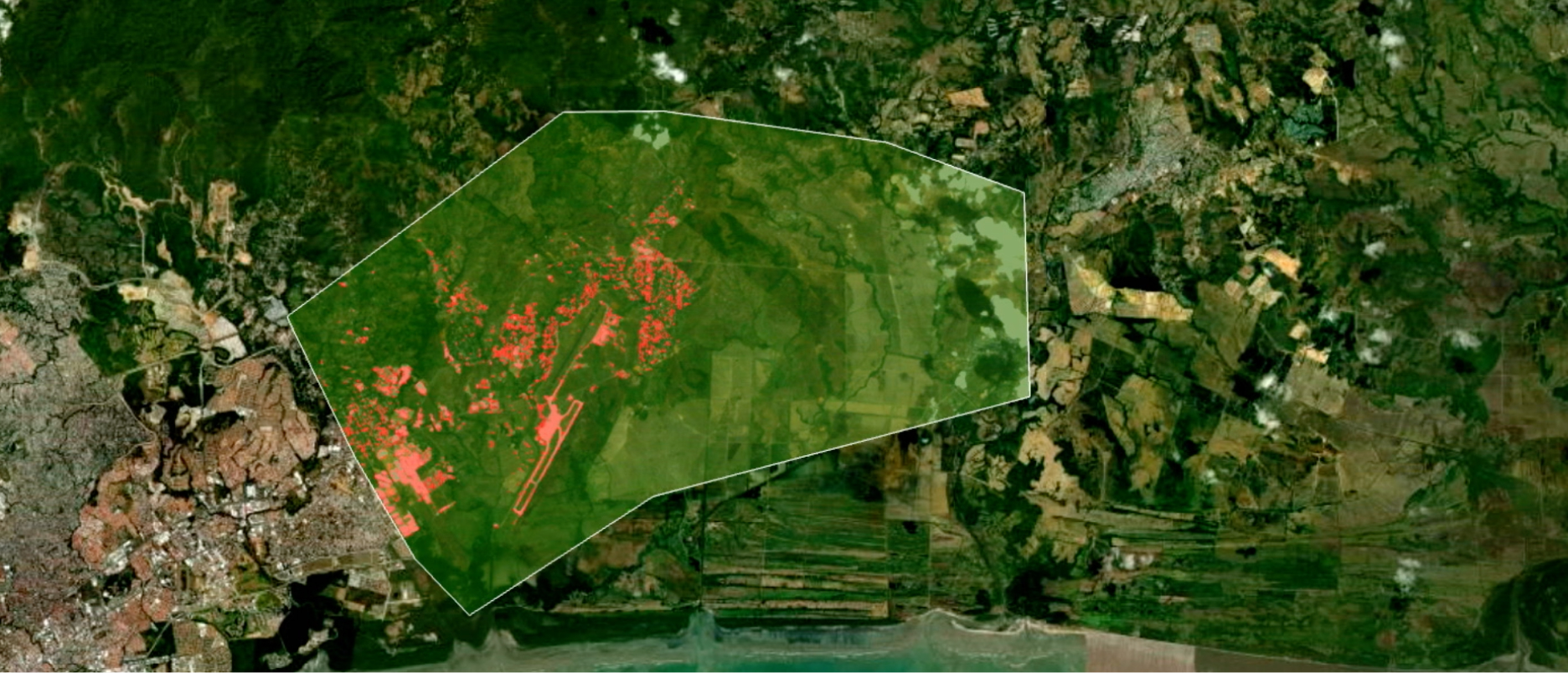 Screenshot from featured video displaying an aerial image of a town 