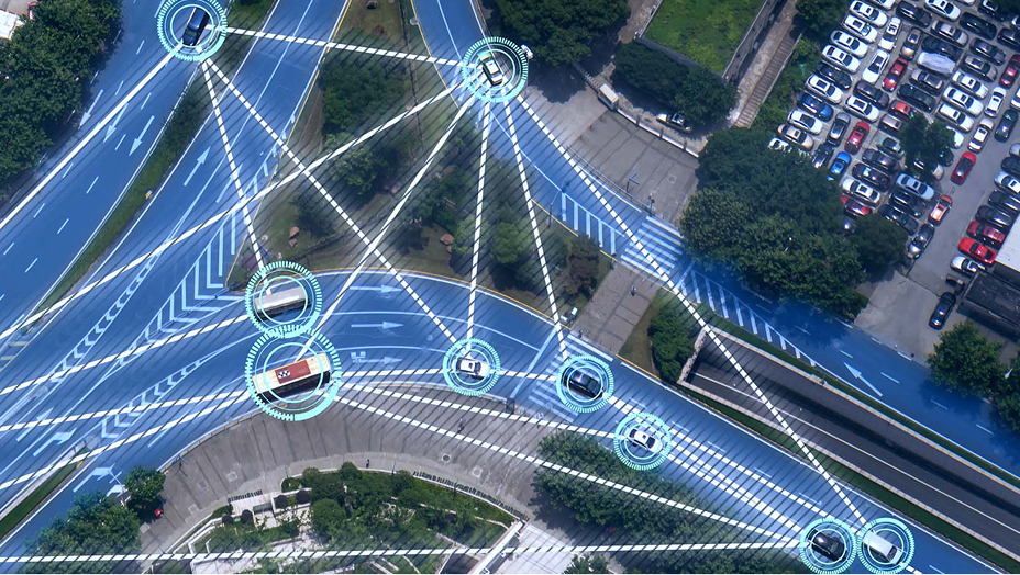 An aerial view of a highway with roads highlighted in blue and white lines that show the distance between vehicles