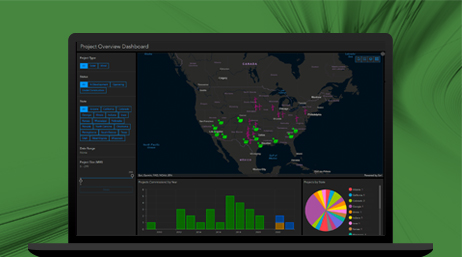 A laptop displaying a dark basemap of the United States with green icons and a dashboard on the insights