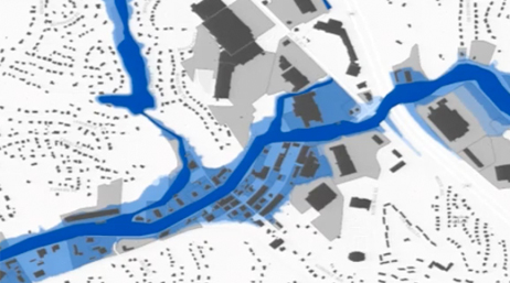 Carte en noir et blanc traversée par une rivière bleue avec zones potentiellement inondables