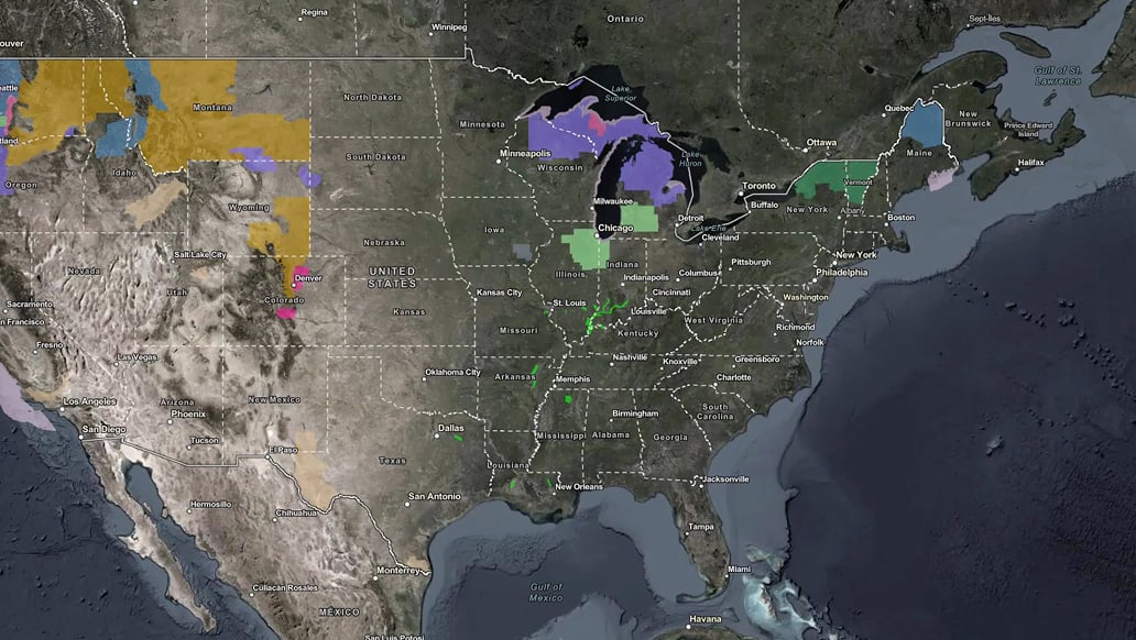 A map of the United States showing colored regional overlays and scattered point data across the Midwest, Great Lakes, and western states