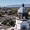 A bird’s eye view of commercial businesses on a sunny day in Redlands, California