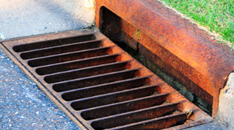 A rusty stormwater drain