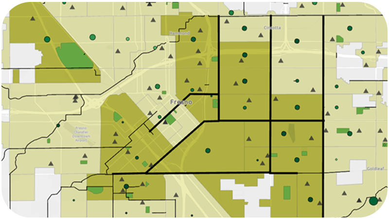 A map displaying boundaries and different regions in varying shades of green with small, dispersed dots