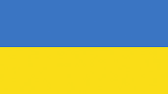 The Ukrainian flag, with two equally-sized horizontal bands of color, sky blue on top and golden yellow on the bottom