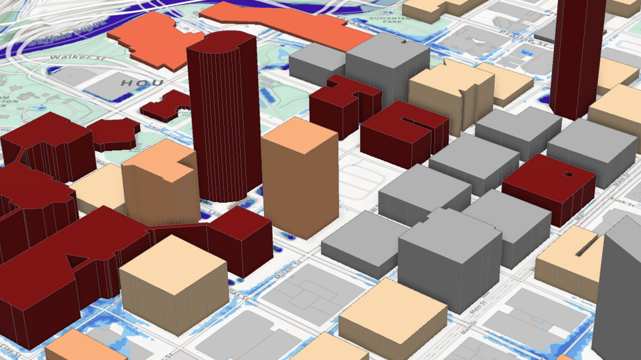 A 3D city model with buildings of different heights displayed on a street grid