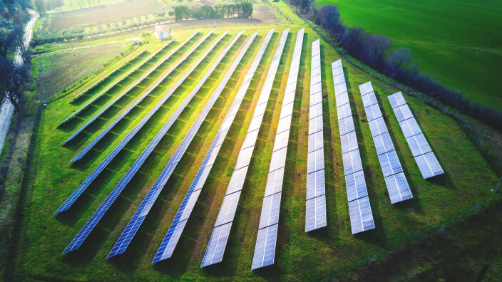 A solar farm in a green field