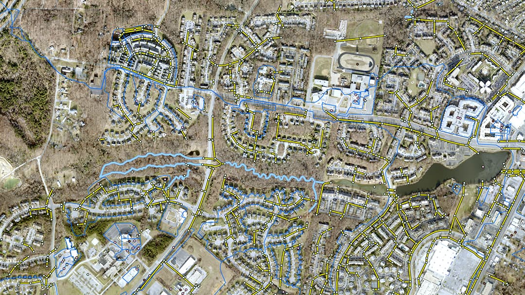 Colorful photo of a water tower that reads, 'West Jackson County Utility District