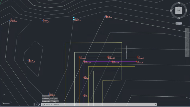 어떤 지형도의 2D CAD 도면을 나타내는, 검은색 배경에 있는 일련의 연결된 선과 빨간색 아이콘