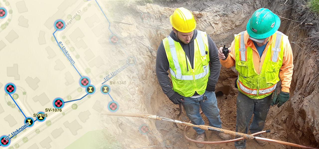 A composite image of a street map with routes shown in blue, beside two people wearing yellow safety vests and hard hats standing in a large hole discussing an exposed cable