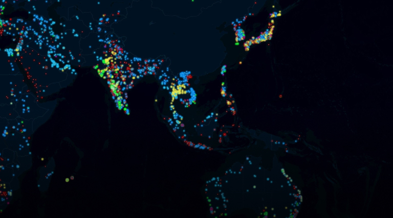 A map with a dark background shows data clusters in glowing dots of red, blue, green, and yellow.