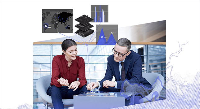 Professional woman and man interact with a tablet showing maps and graphs