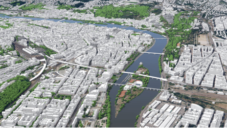 A 3D digital map of Prague, Czech Republic shows bridges spanning the Vltava River