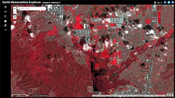 Imagem de satélite Landsat com renderização "infravermelho colorido com DRA" aplicada.