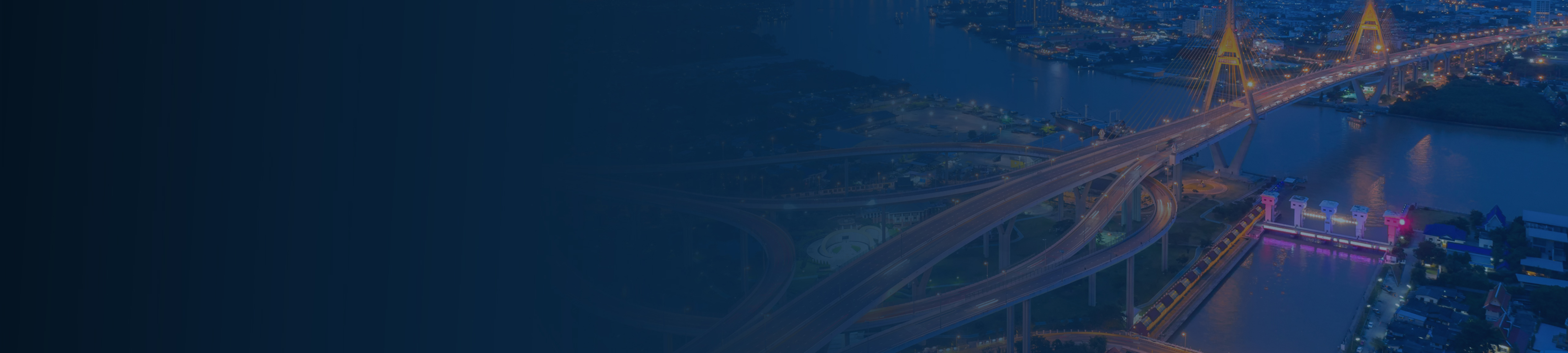 Aerial view of a city brightly lit for nighttime with a highway bridge arching over a river, overlaid with several small colorful maps