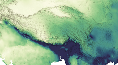Una vista satelital de la tierra sombreada en tonos verdes y azules