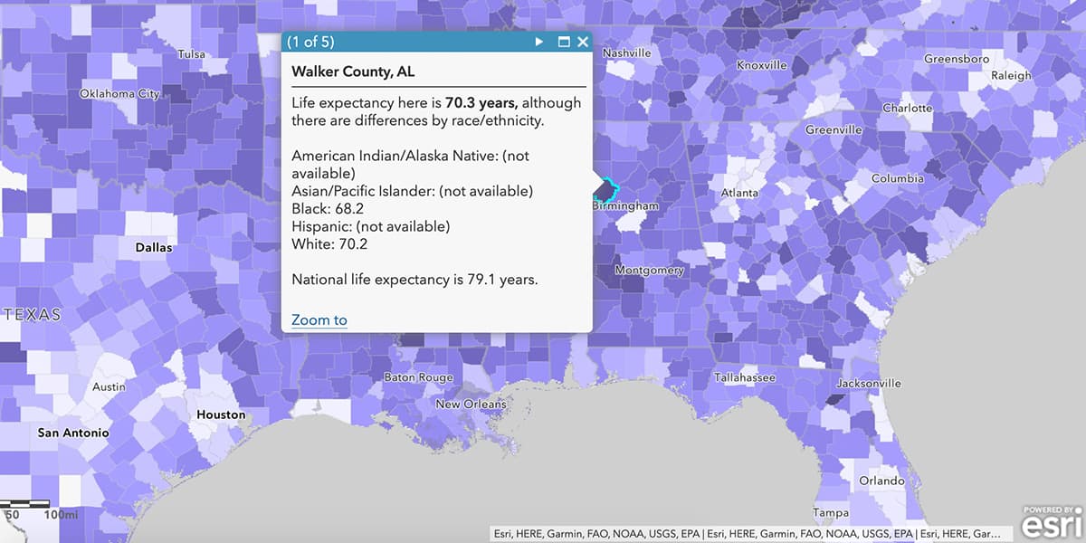  A screenshot of ArcGIS software displaying a purple map and a dialog box showing life expectancy information for Walker County, Alabama