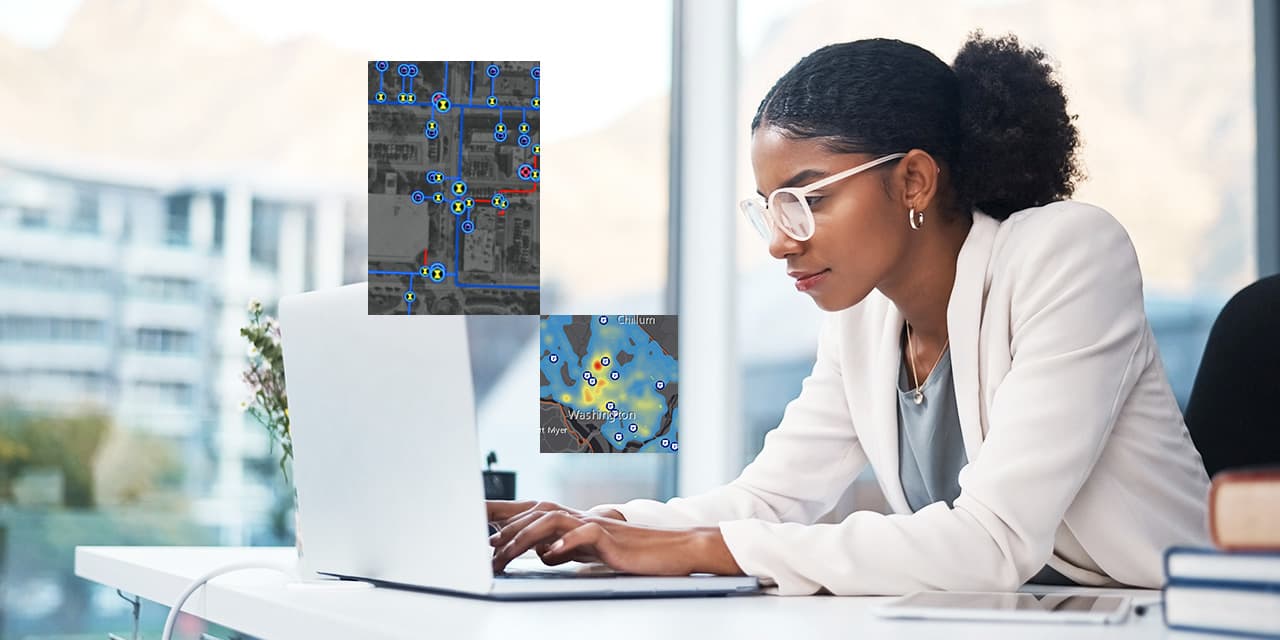 A person sitting at a desk using a laptop in a light-filled room overlaid with two different maps