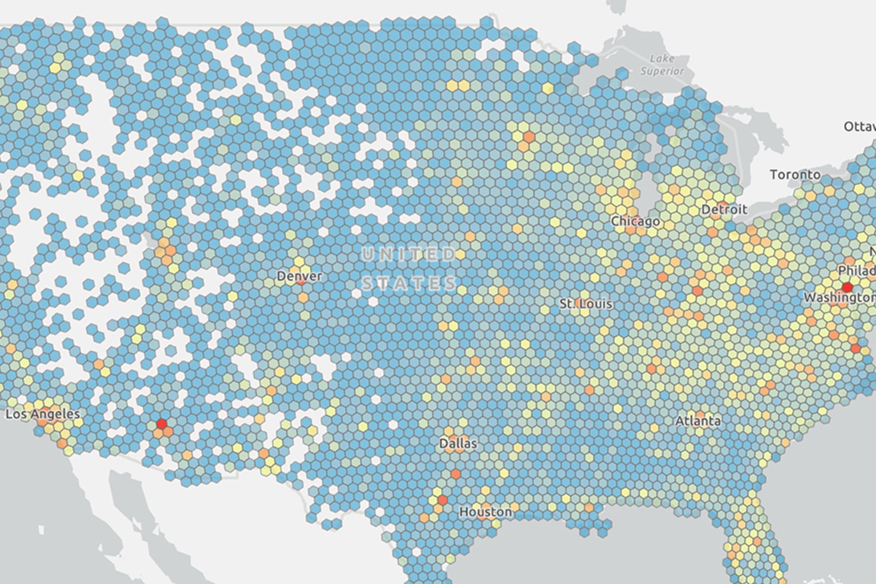Light blue map of the US with yellow data points.
