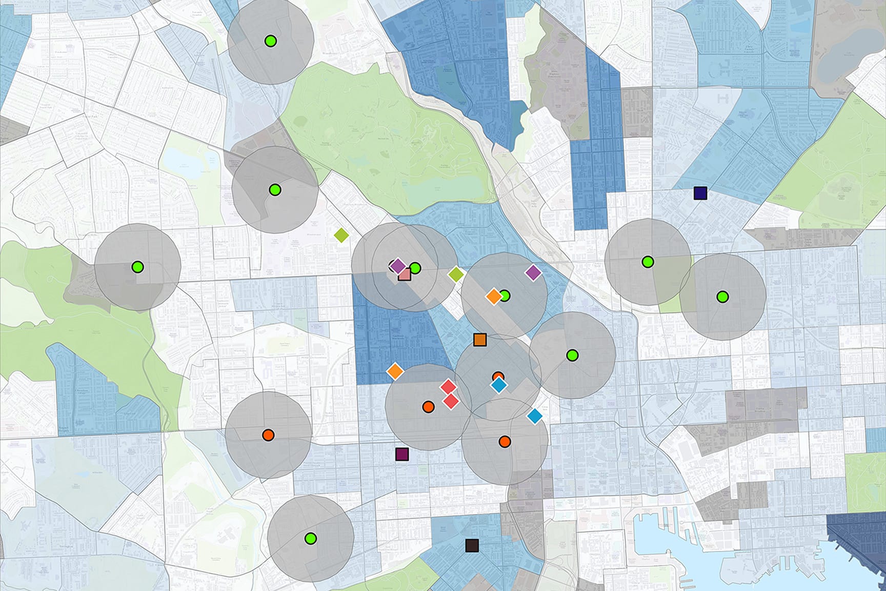 Blue map with data points of clinic locations with circles around them highlighting their service areas.