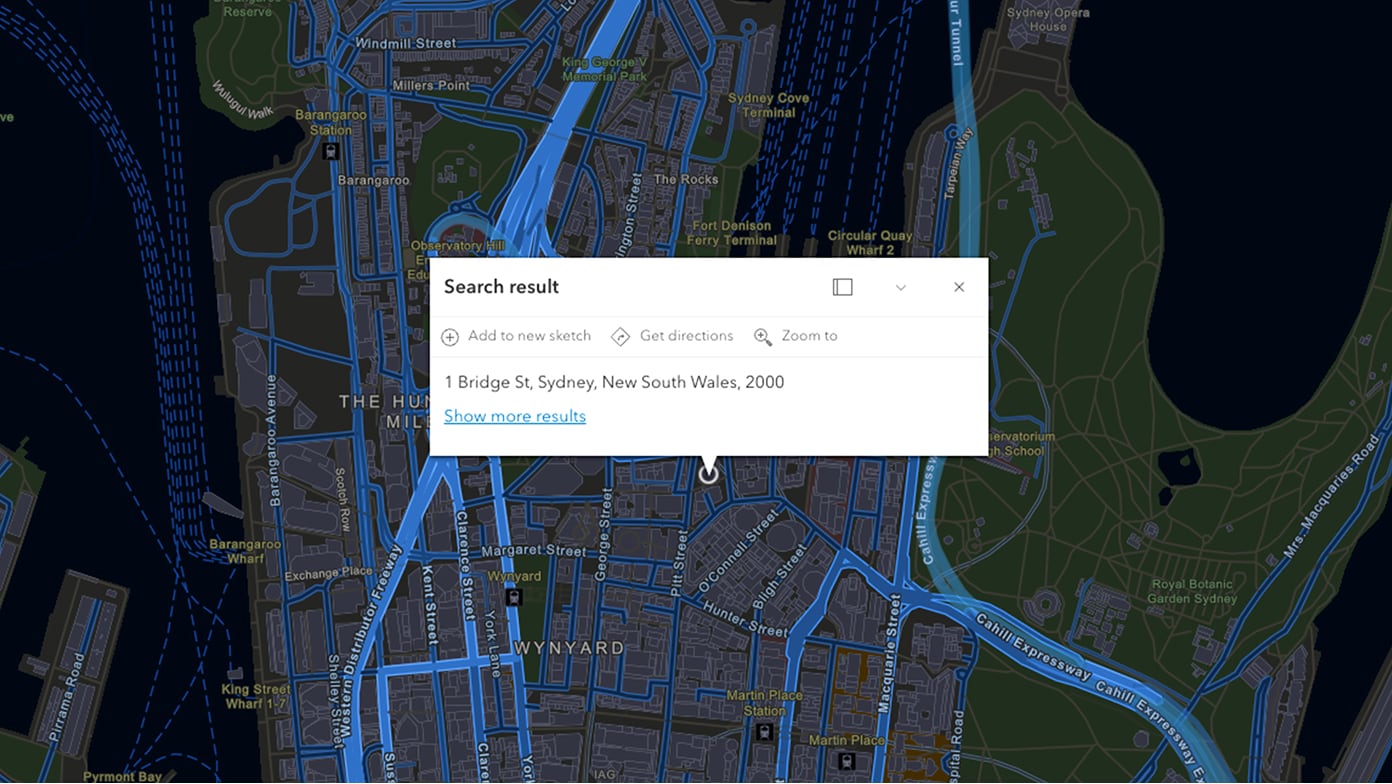 A digital map interface displays a highlighted urban area with roads and waterways in dark blue tones.