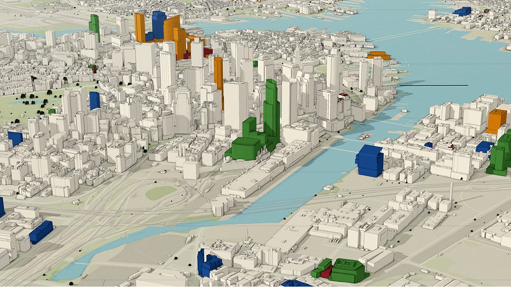A detailed 3D rendering of a cityscape features various buildings, with select structures highlighted in green, blue, and orange. 