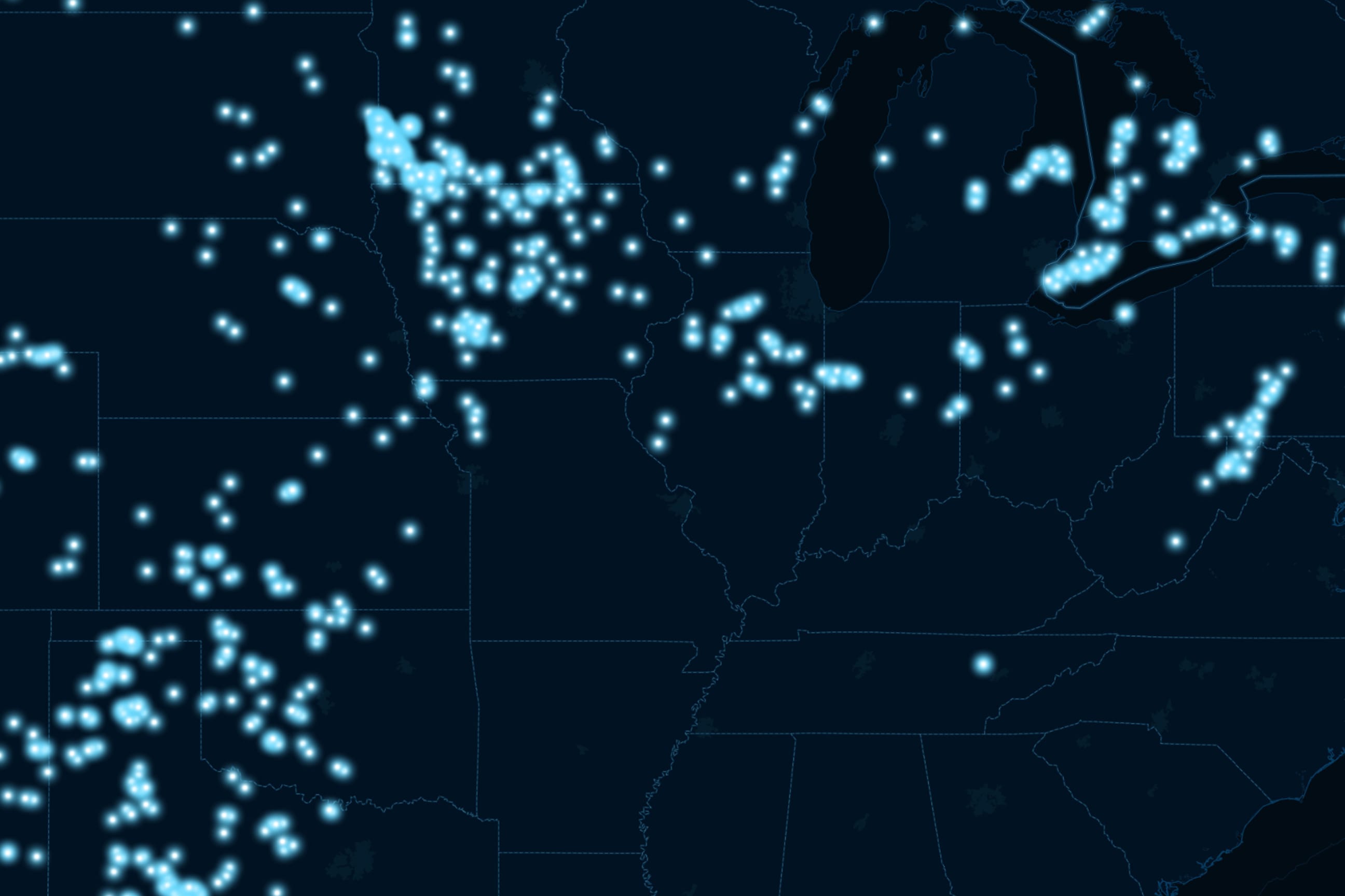 Map of the central and eastern United States shows clusters of bright blue dots