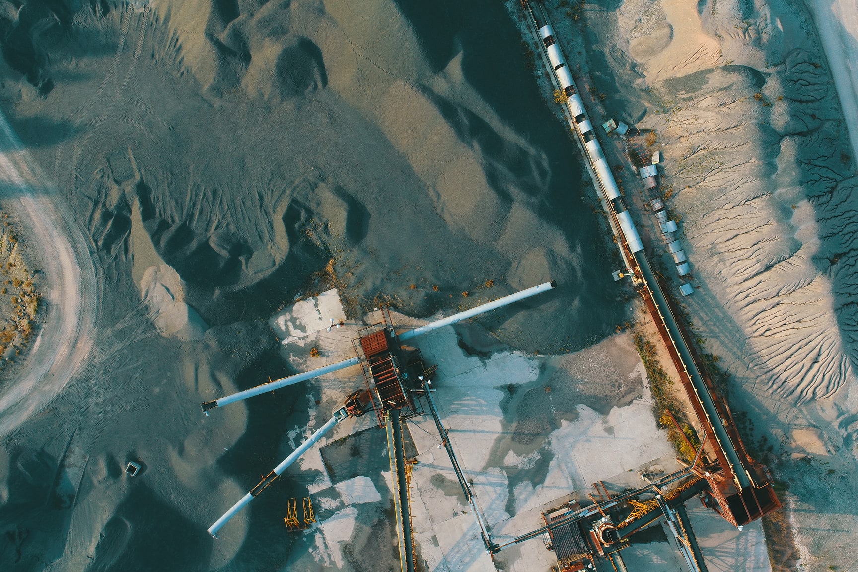 Image of equipment in working on an active mineral mine